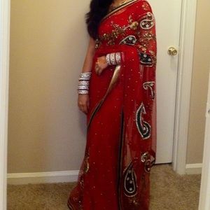 Red saree with nice embroidery